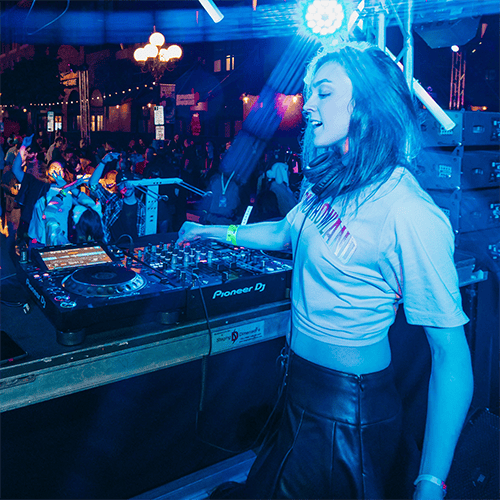 Woman DJing a party