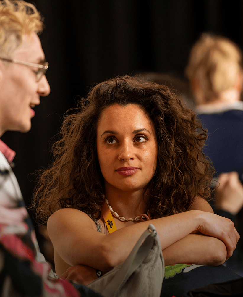 TwitchCon attendees gathering and socializing at a Community MeetUp